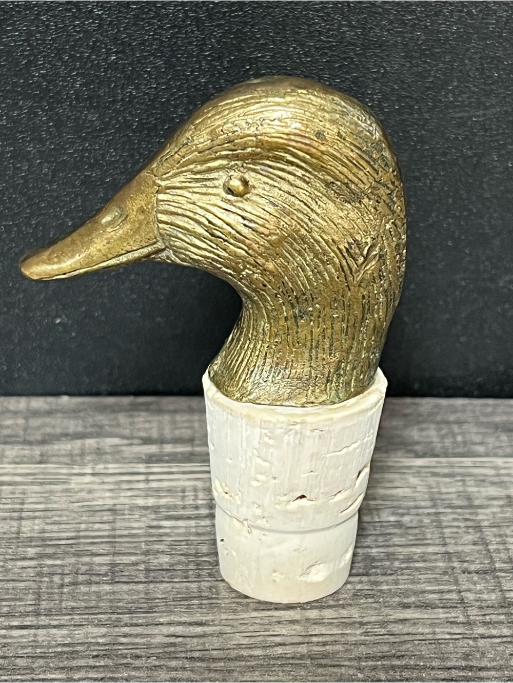 Brass duck head bottle stopper. Natural patina. Heavy! Cottagecore